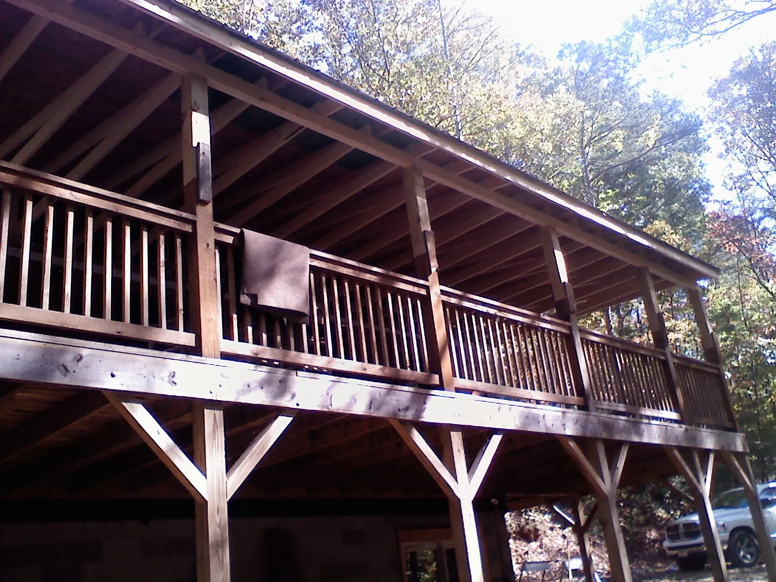 Timber framing under a new elevated porch and deck — Roof Leak Repair in Lamy by Roofing Brothers
